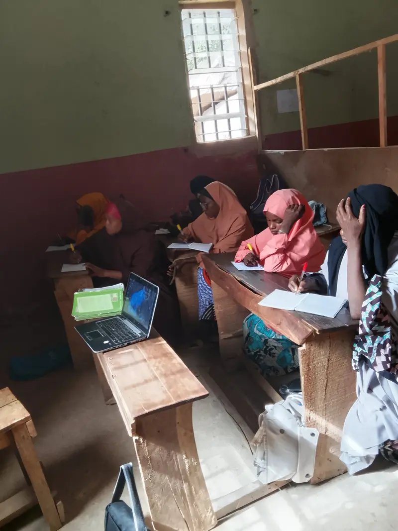 A segment of staff being trained on Nelson handwriting